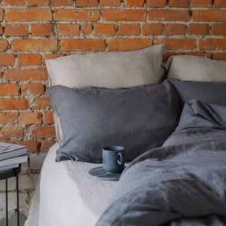 Dark Grey Soft Washed Linen Pillowcases In Bed 